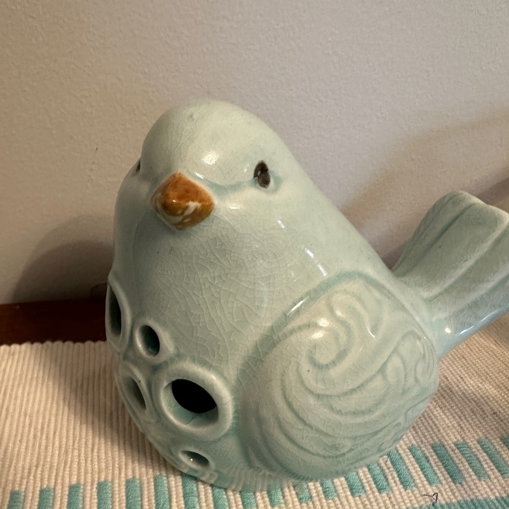 Blue Ceramic Bird with Decorative Cutouts